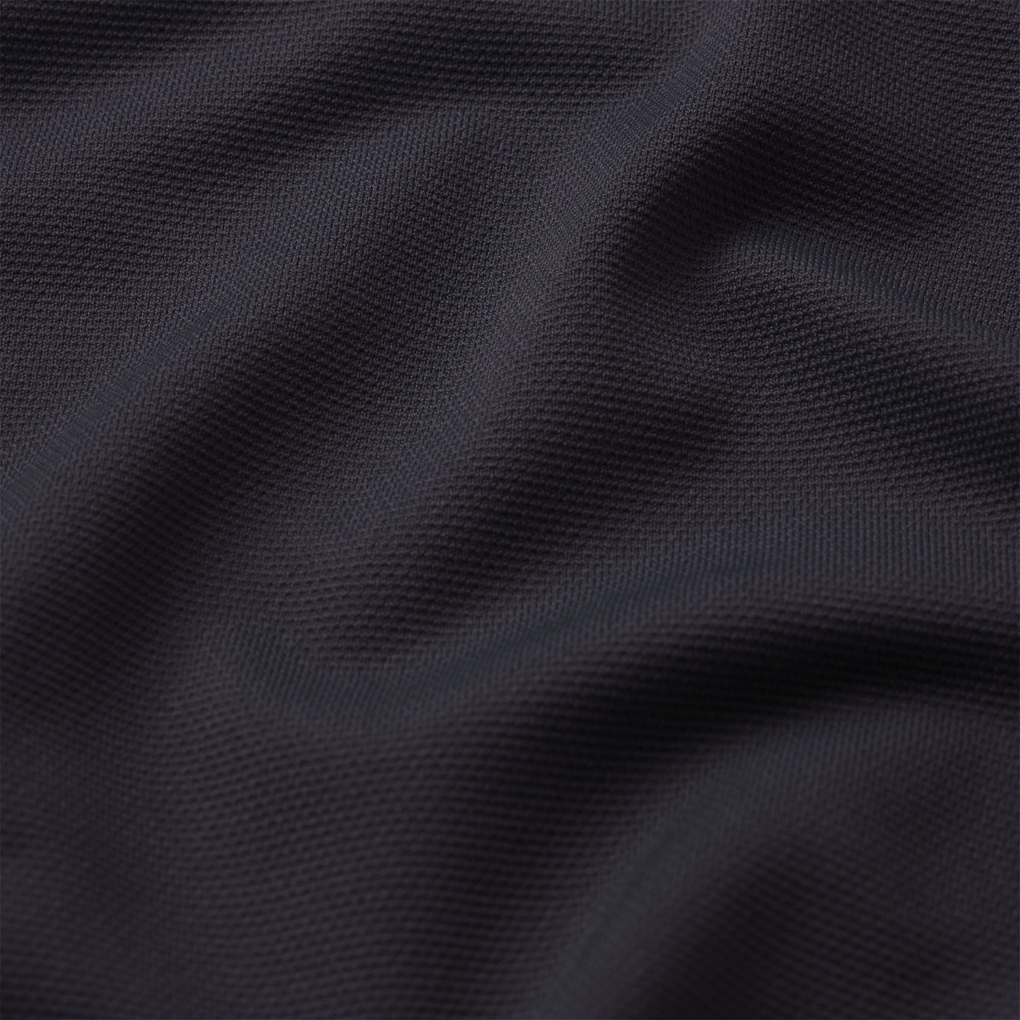 NikeSKIMS AIRY DRI-FIT™ BABY T-SHIRT | OBSIDIAN & LAYS FLAT ON A WHITE BACKGROUND | FLT