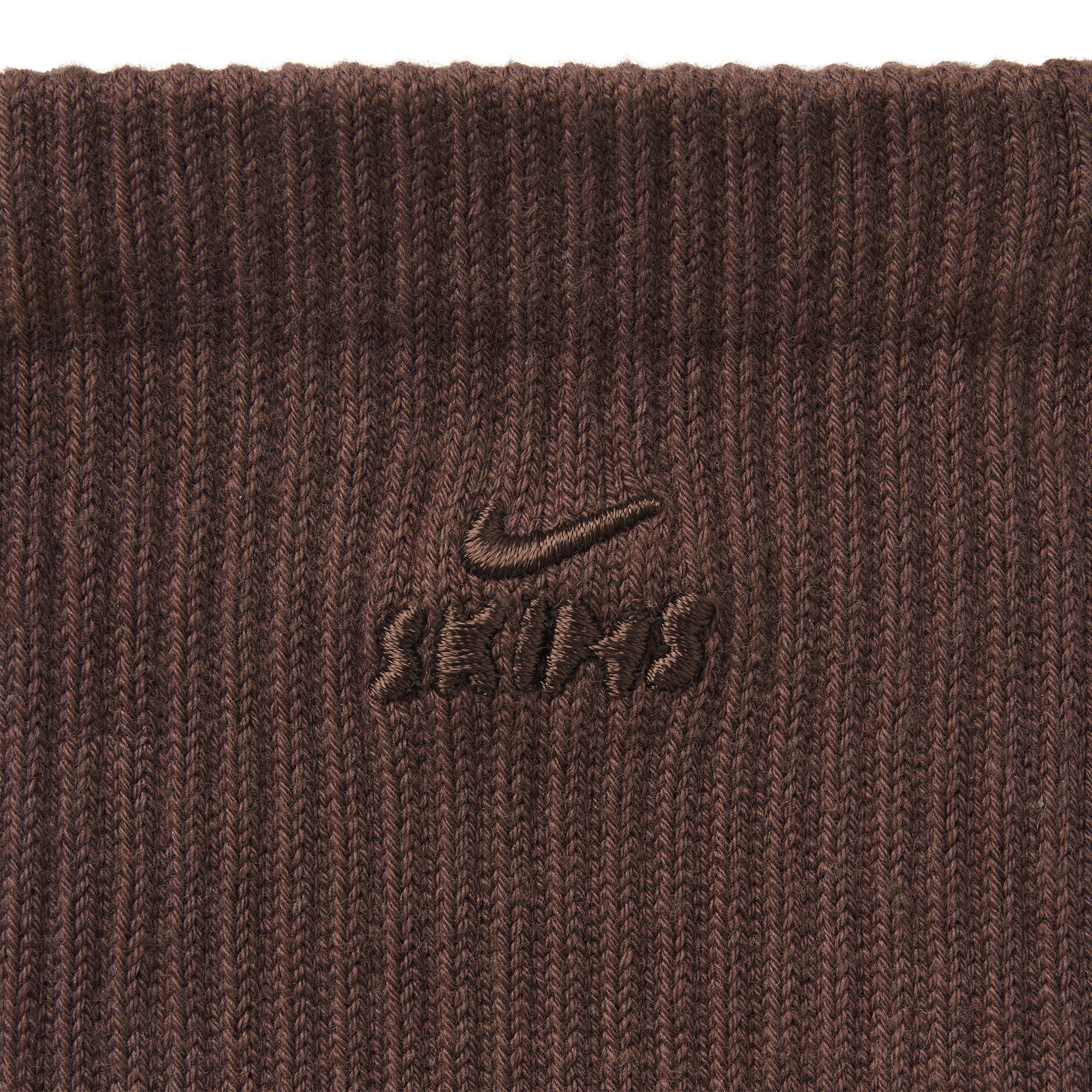 NikeSKIMS ACCESSORIES DRI-FIT PILATES GRIP CREW SOCK | DARK SEPIA FLAT ON A WHITE BACKGROUND