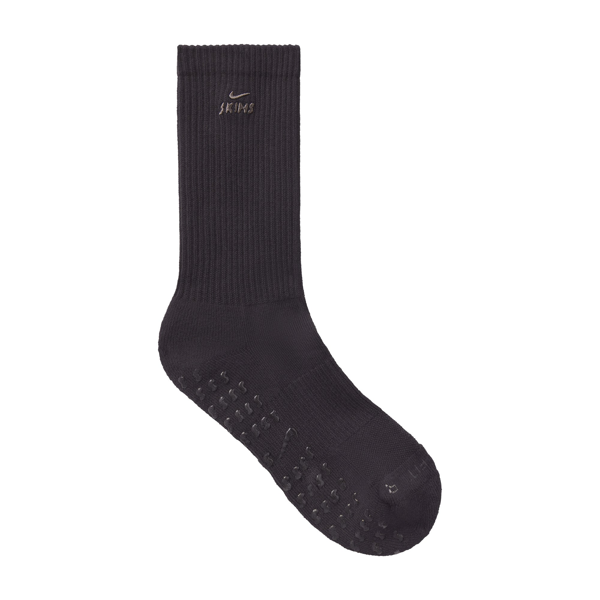 NikeSKIMS ACCESSORIES DRI-FIT PILATES GRIP CREW SOCK | OBSIDIAN FLAT ON A WHITE BACKGROUND