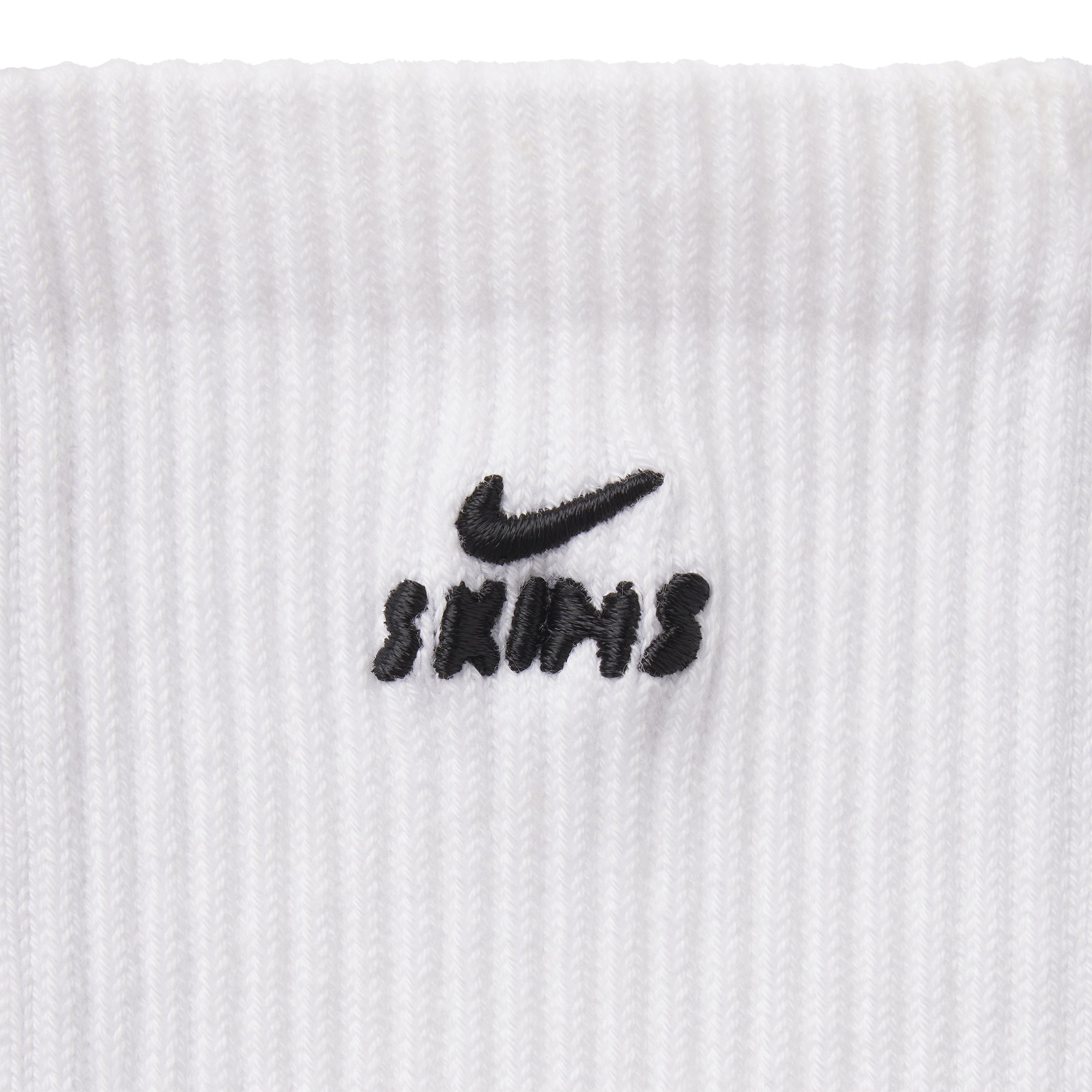 NikeSKIMS ACCESSORIES DRI-FIT PILATES GRIP CREW SOCK | SNOW FLAT ON A WHITE BACKGROUND