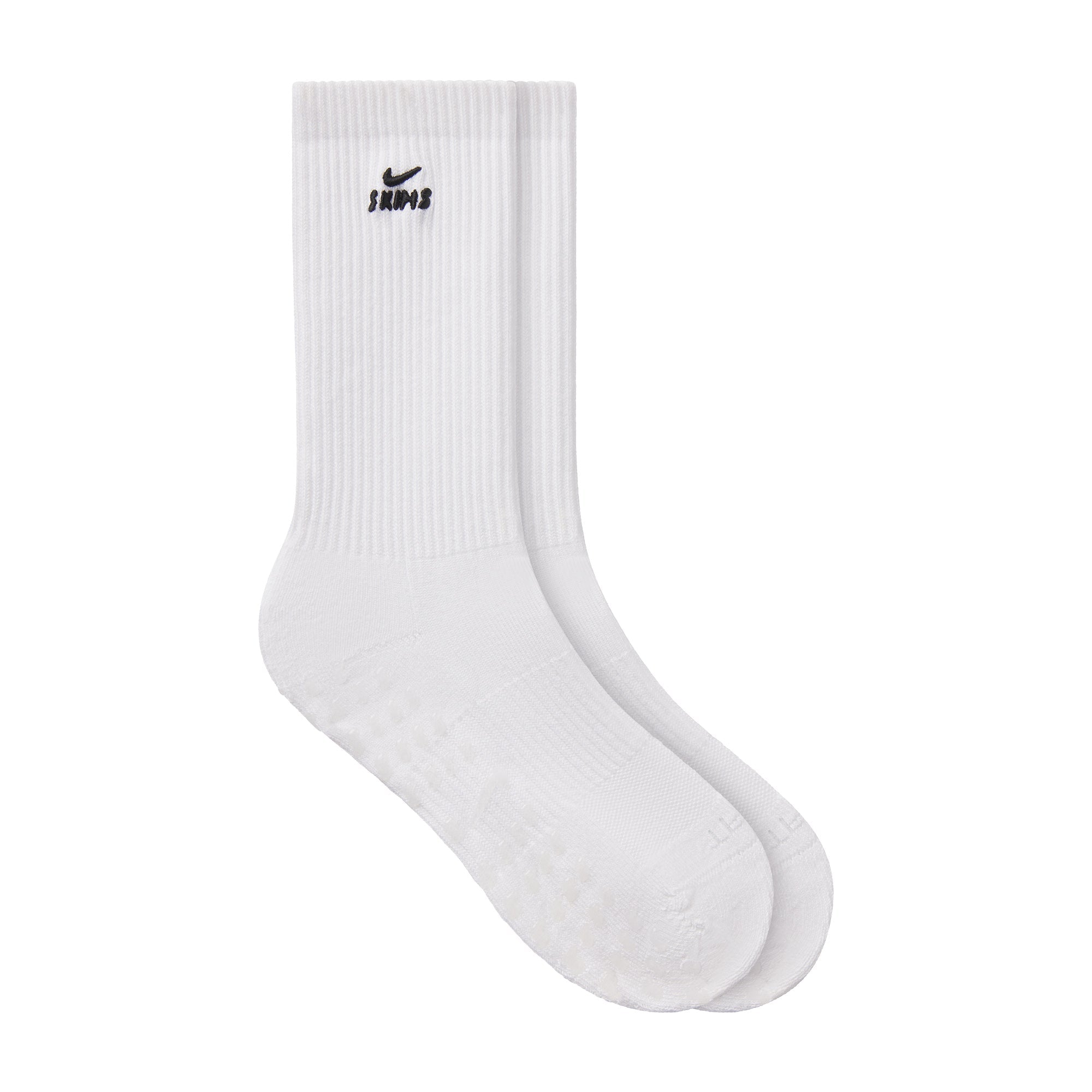 NikeSKIMS ACCESSORIES DRI-FIT PILATES GRIP CREW SOCK | SNOW FLAT ON A WHITE BACKGROUND