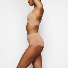 SOFT SMOOTHING BOY SHORT WORN BY A MODEL IN SIDE VIEW