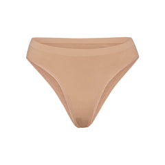SOFT SMOOTHING SEAMLESS BRIEF | OCHRE (BRIEFS, PANTIES) LAYS FLAT ON A WHITE BACKGROUND | FLT