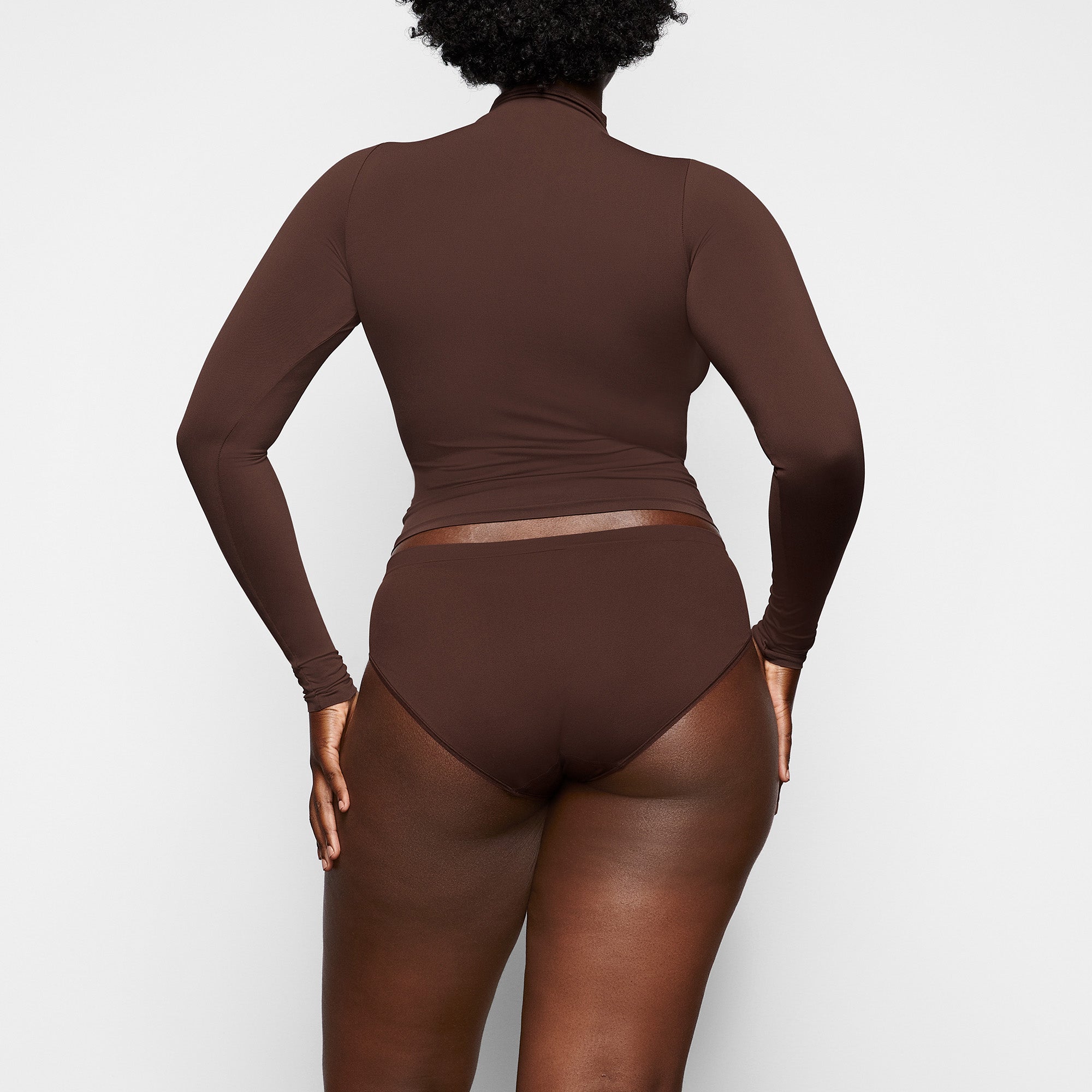 SOFT SMOOTHING BRIEF WORN BY A MODEL IN BACK VIEW