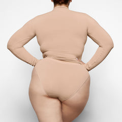 SOFT SMOOTHING BRIEF WORN BY A MODEL IN BACK VIEW