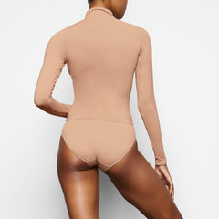 SOFT SMOOTHING BRIEF WORN BY A MODEL IN BACK VIEW