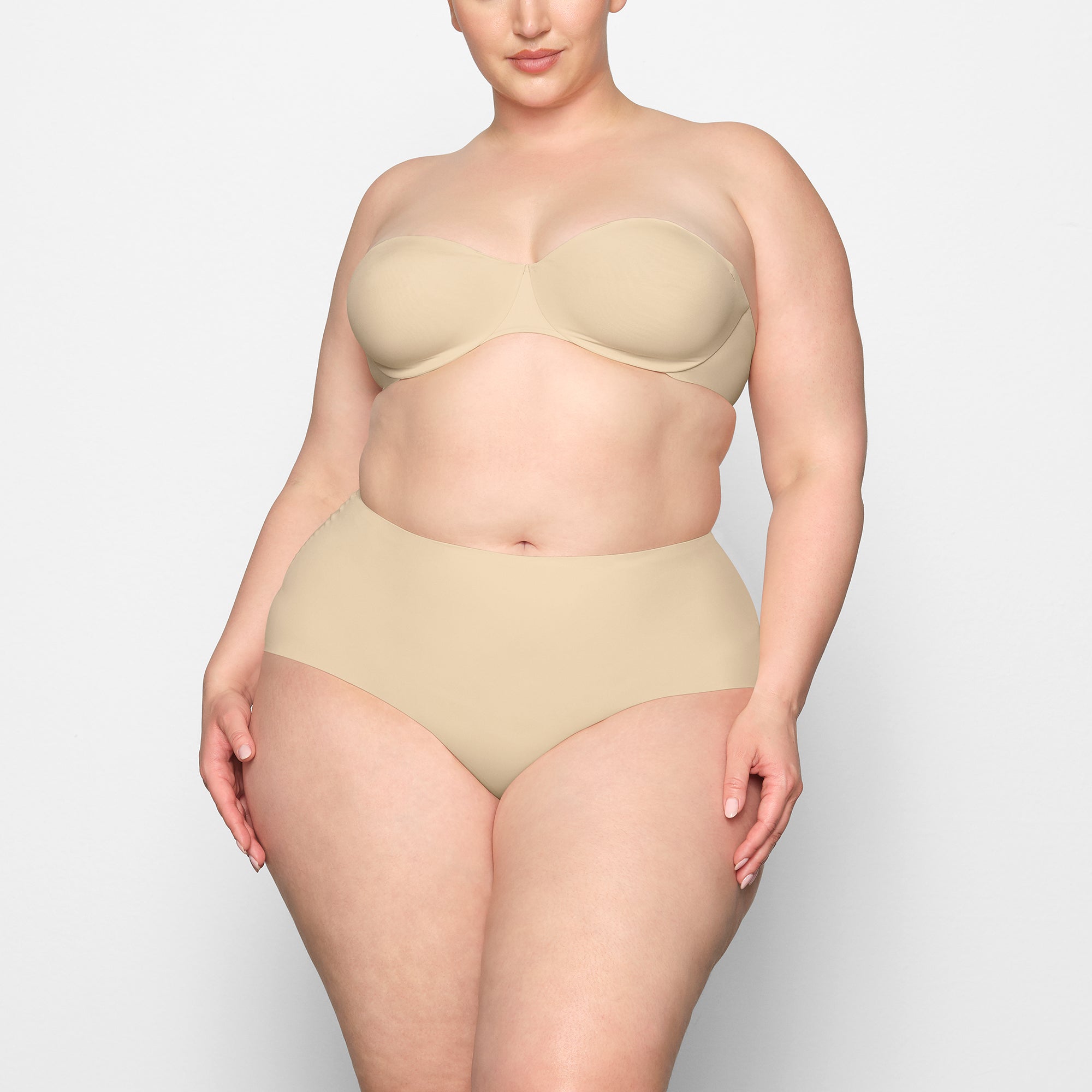 SMOOTHING HIGH WAIST BRIEF WORN BY A MODEL IN FRONT VIEW 