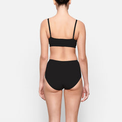 BACK VIEW OF THE COTTON JERSEY FULL BRIEF ON A MODEL | about this fabric