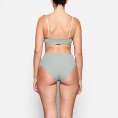BACK VIEW OF THE COTTON JERSEY FULL BRIEF ON A MODEL