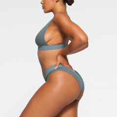 COTTON RIB BRIEF WORN BY A MODEL IN SIDE VIEW 