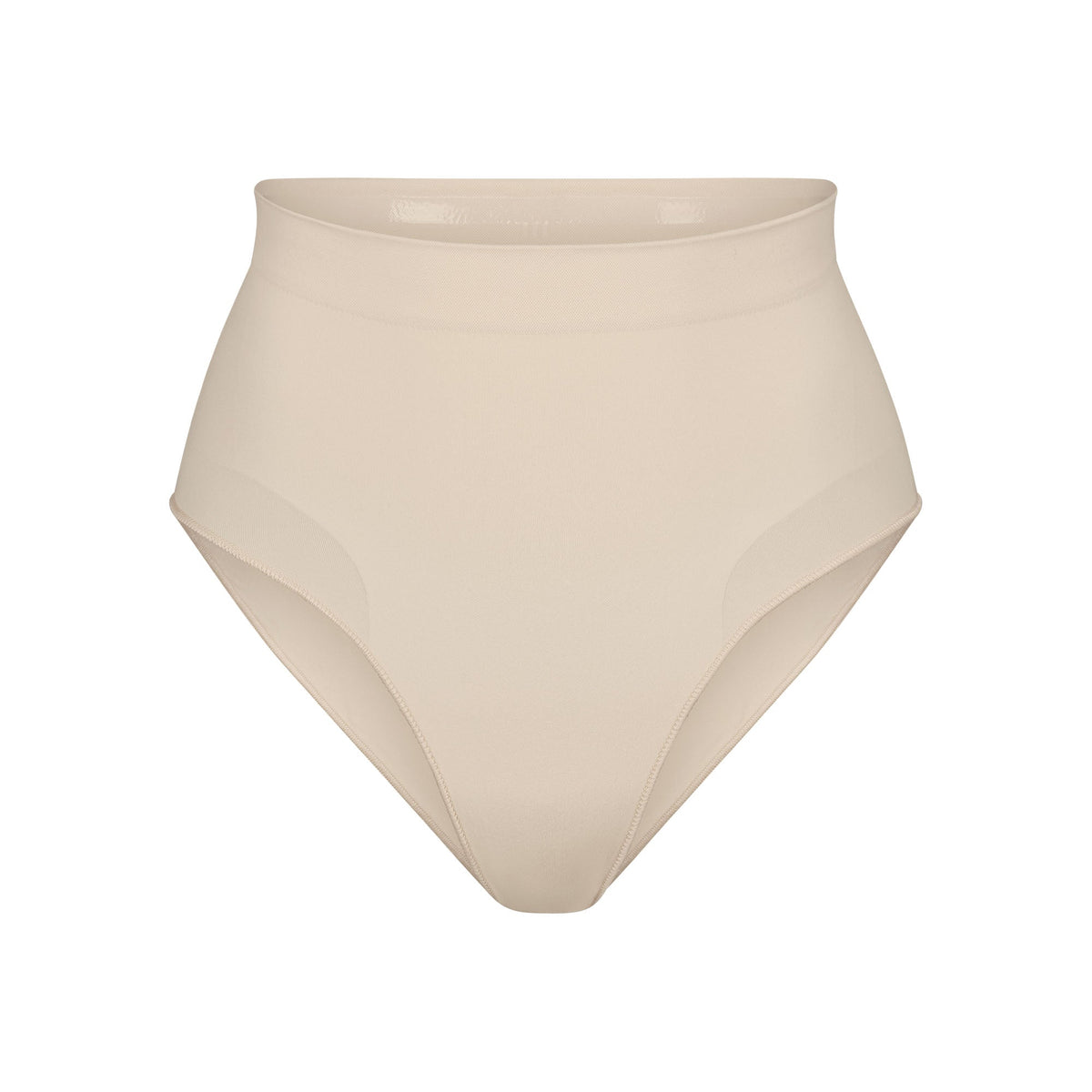 SEAMLESS SCULPT MID WAIST BRIEF | SAND (SHAPEWEAR BRIEFS, PANTIES) LAYS FLAT ON A WHITE BACKGROUND | FLT