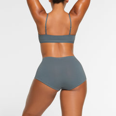 COTTON JERSEY BOY SHORT WORN BY A MODEL IN BACK VIEW