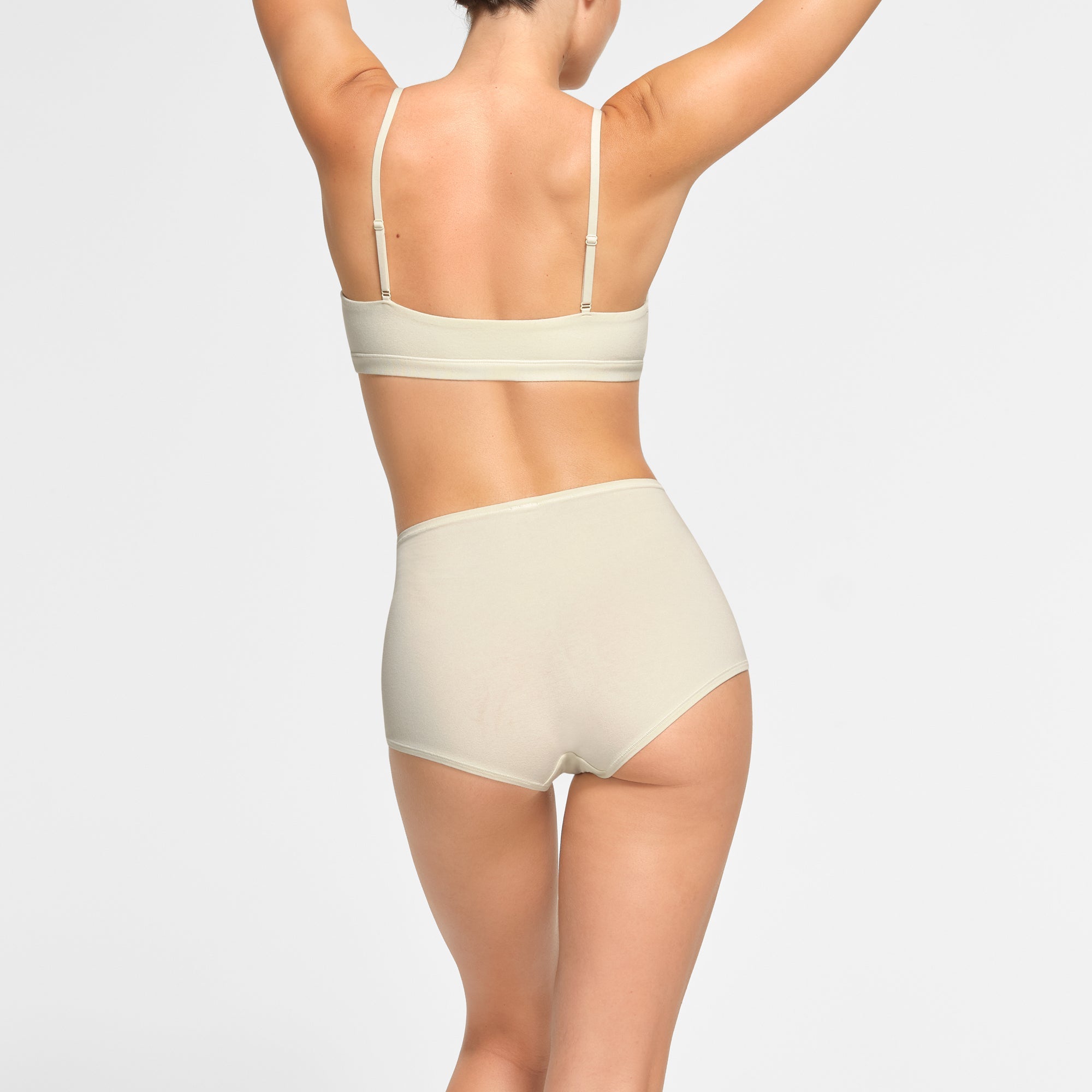COTTON JERSEY BOY SHORT WORN BY A MODEL IN BACK VIEW