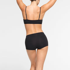 COTTON JERSEY BOY SHORT WORN BY A MODEL IN BACK VIEW