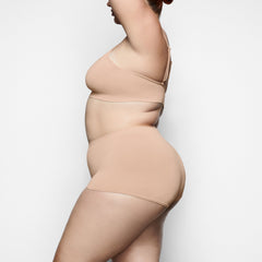 SOFT SMOOTHING BOY SHORT WORN BY A MODEL IN SIDE VIEW