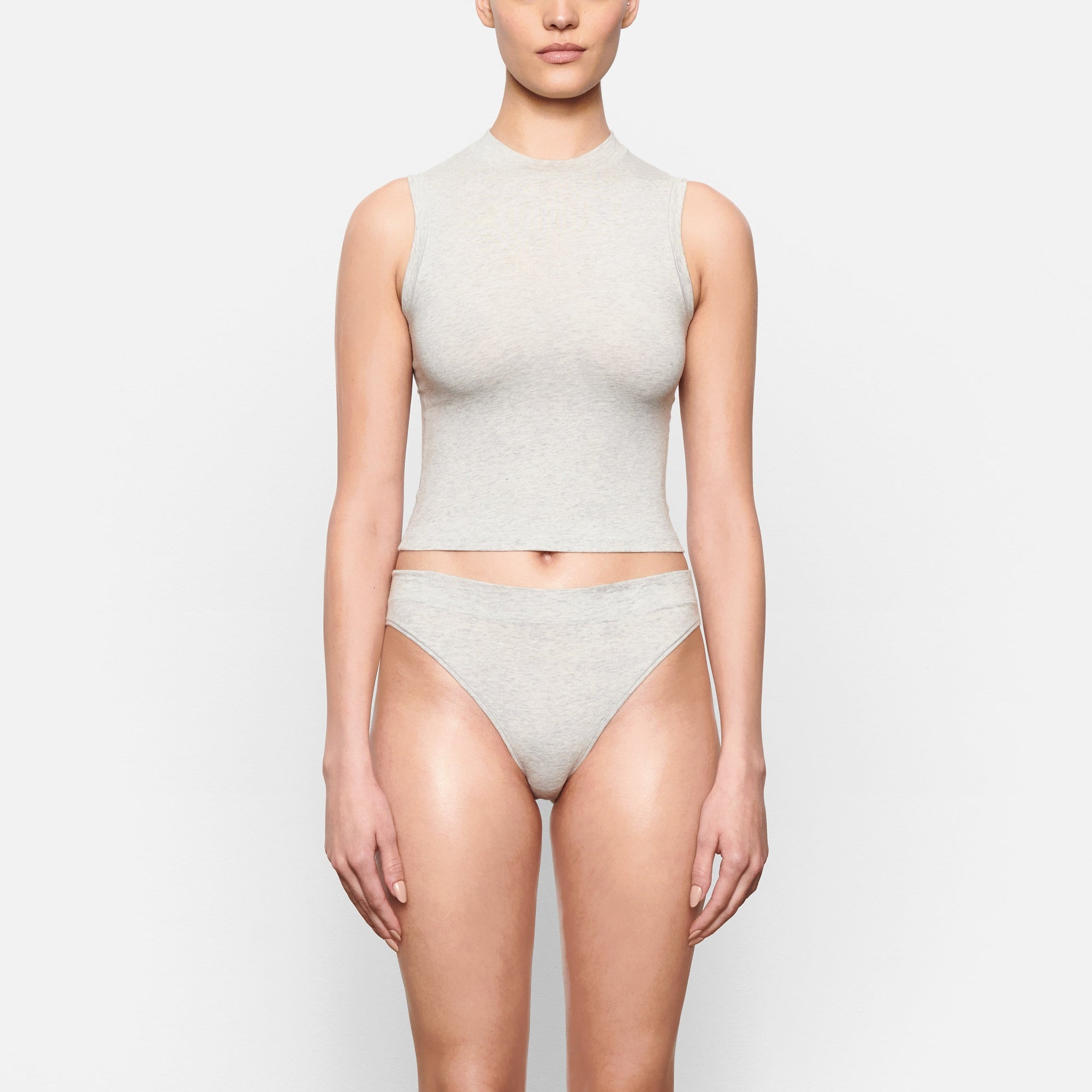 COTTON JERSEY CHEEKY TANGA WORN BY A MODEL IN FRONT VIEW
