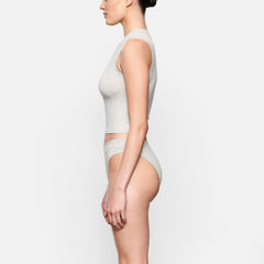 COTTON JERSEY CHEEKY TANGA WORN BY A MODEL IN SIDE VIEW