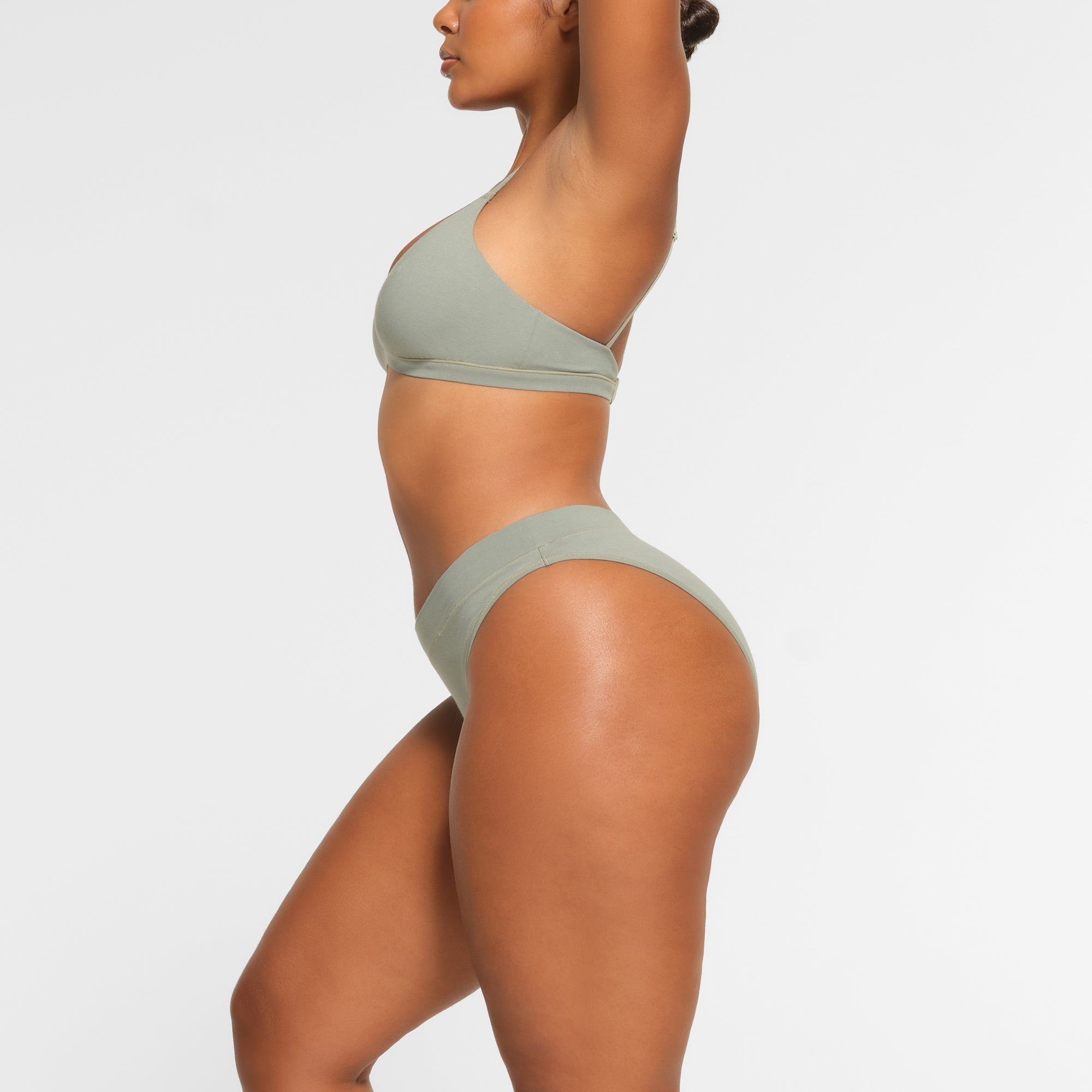 COTTON JERSEY CHEEKY TANGA WORN BY A MODEL IN SIDE VIEW