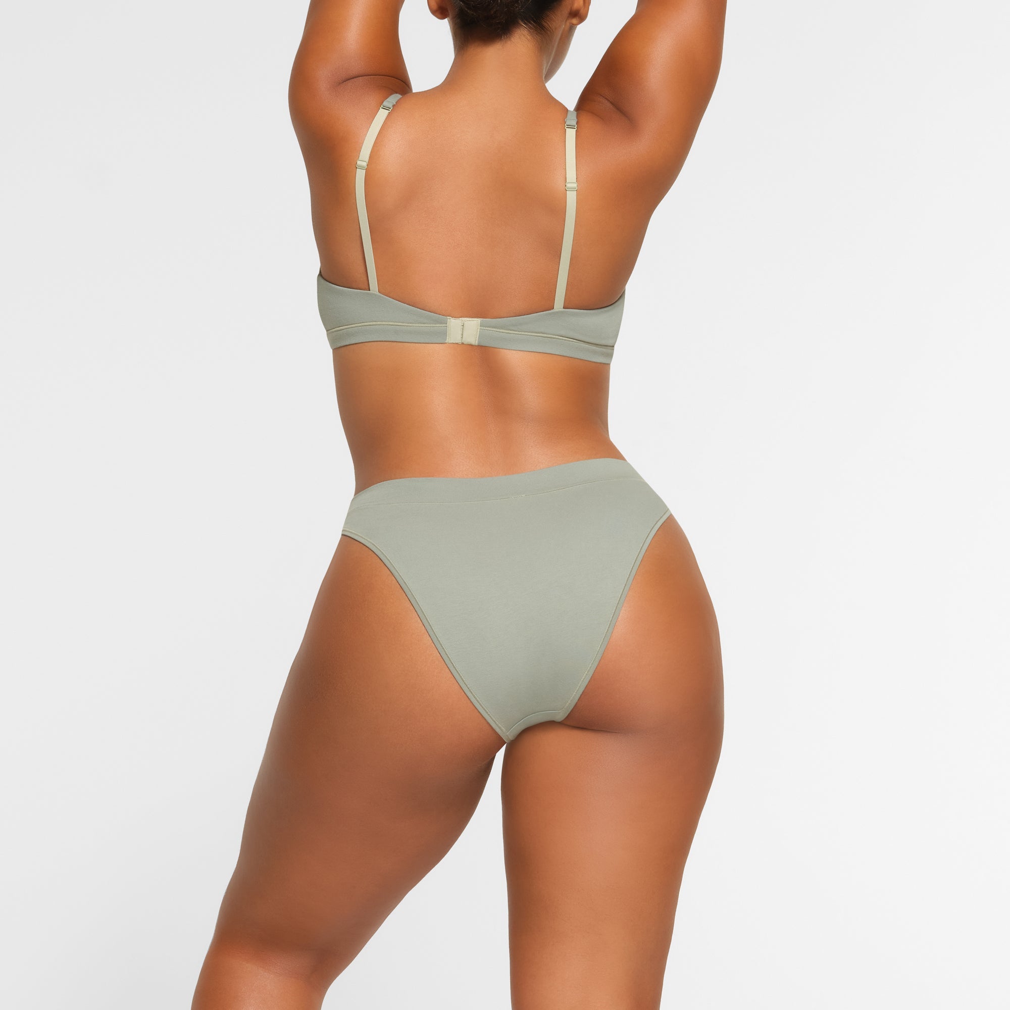 COTTON JERSEY CHEEKY TANGA WORN BY A MODEL IN BACK VIEW