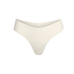 COTTON JERSEY DIPPED THONG | BONE FLAT ON A WHITE BACKGROUND | FLT