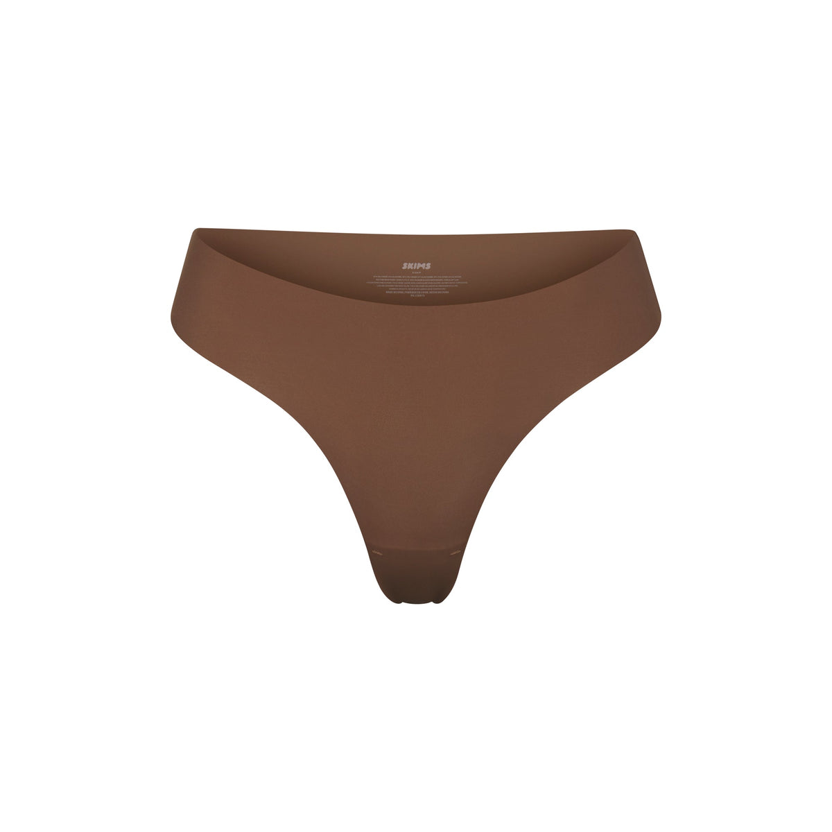 NAKED DIPPED THONG | JASPER (THONGS, PANTIES) LAYS FLAT ON A WHITE BACKGROUND | FLT
