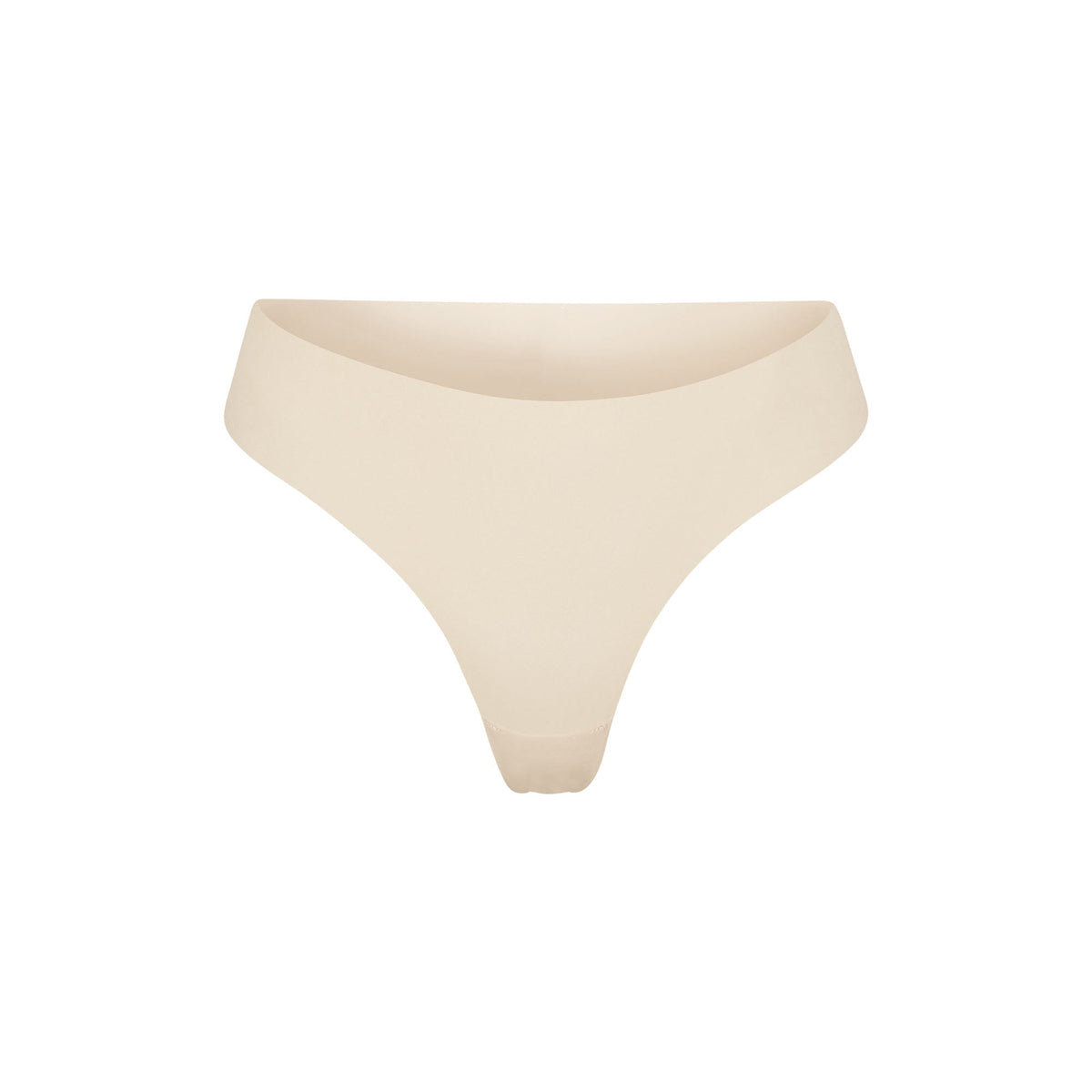 NAKED DIPPED THONG | SAND (THONGS, PANTIES) LAYS FLAT ON A WHITE BACKGROUND | FLT