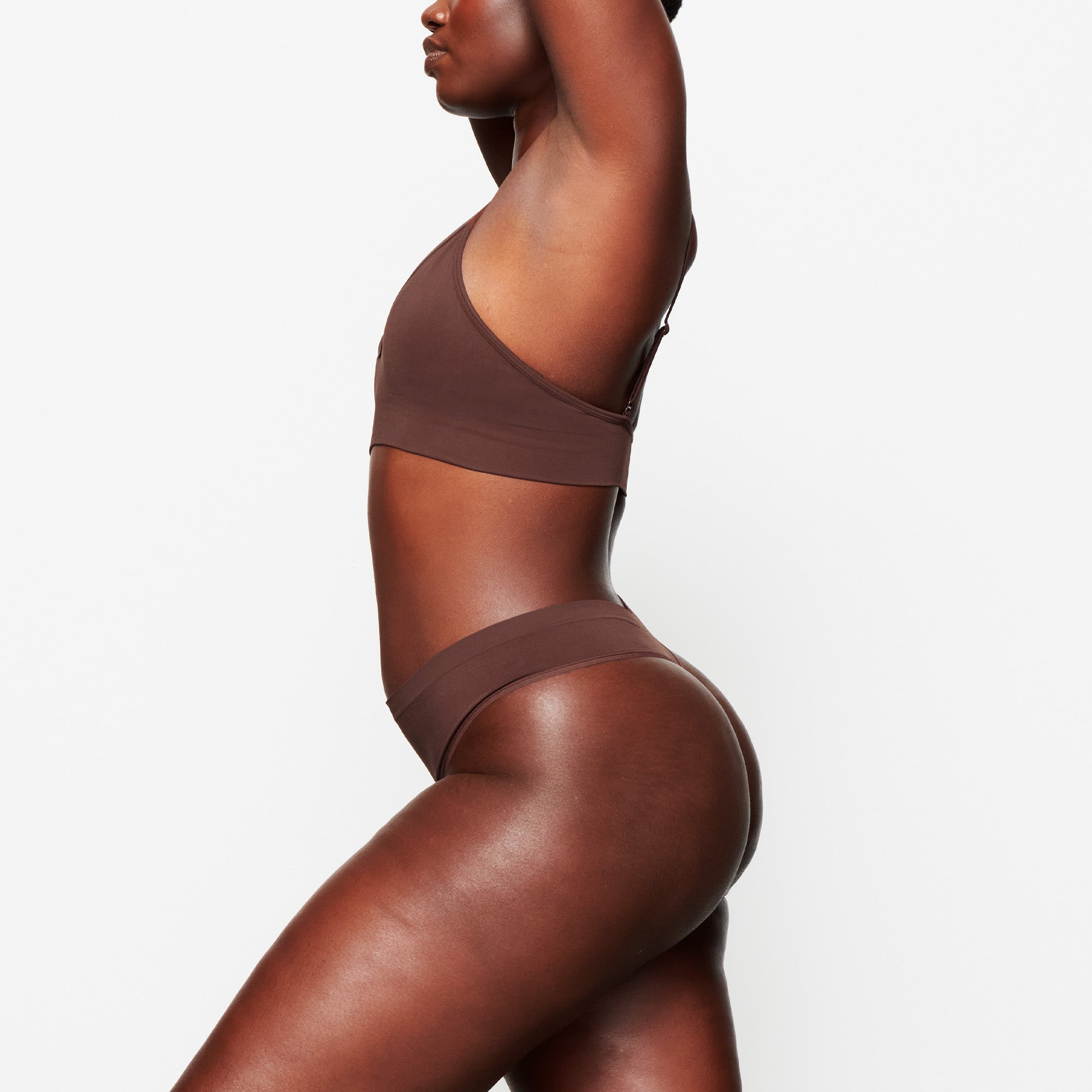 SOFT SMOOTHING THONG WORN BY A MODEL IN SIDE VIEW