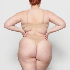 SOFT SMOOTHING THONG WORN BY A MODEL IN BACK VIEW