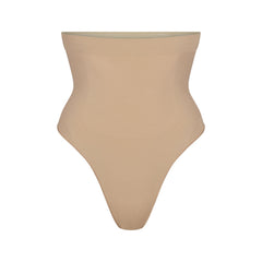 SEAMLESS SCULPT HIGH-WAISTED THONG | CLAY (SHAPEWEAR THONGS, PANTIES) LAYS FLAT ON A WHITE BACKGROUND | FLT