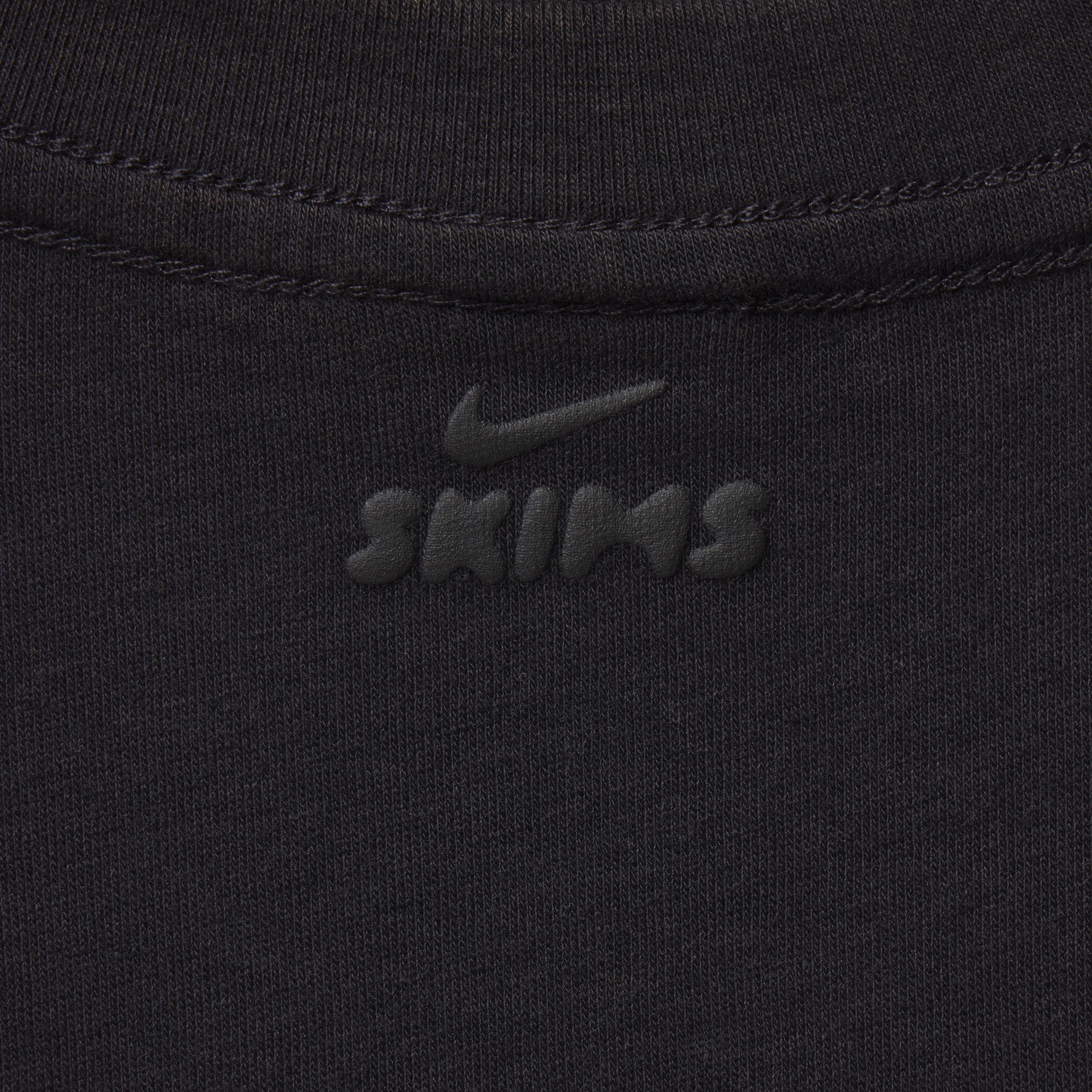 NikeSKIMS PERFORMANCE COTTON BLEND CROP TANK | OBSIDIAN & LAYS FLAT ON A WHITE BACKGROUND | FLT