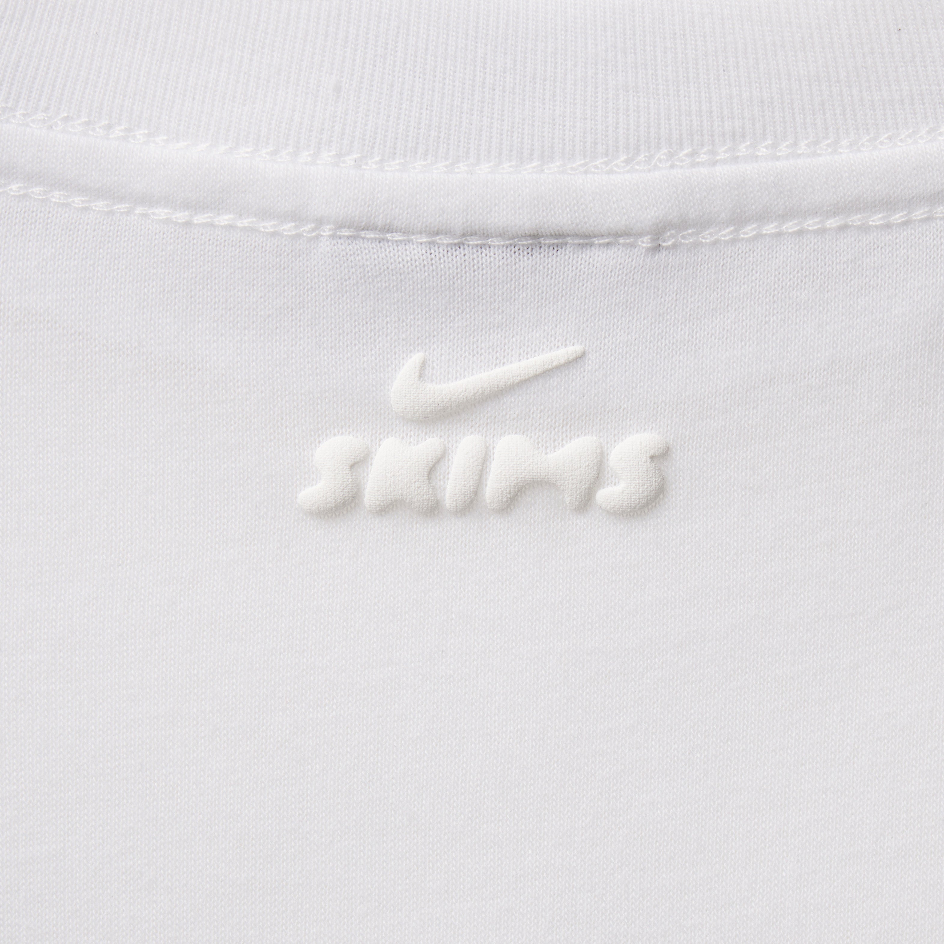 NikeSKIMS PERFORMANCE COTTON BLEND CROP TWIST TANK | SNOW & LAYS FLAT ON A WHITE BACKGROUND | FLT