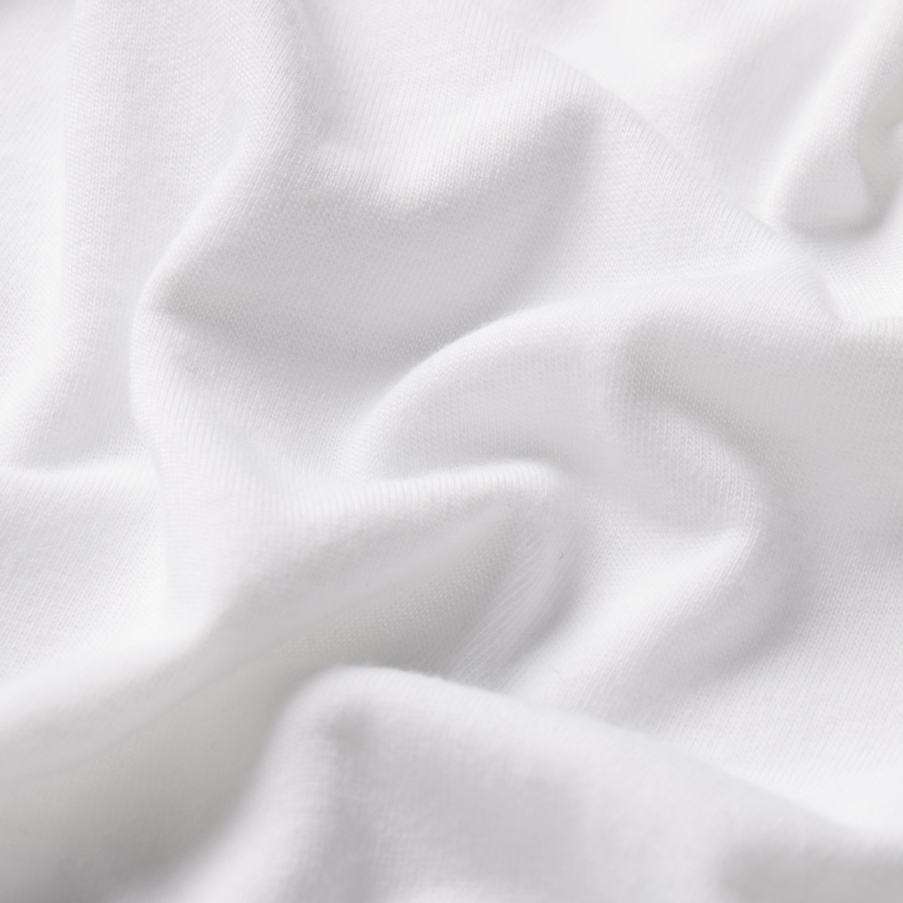 NikeSKIMS PERFORMANCE COTTON BLEND CROP TWIST TANK | SNOW & LAYS FLAT ON A WHITE BACKGROUND | FLT