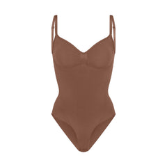 SEAMLESS SCULPT BRIEF BODYSUIT | JASPER (SHAPEWEAR BODYSUITS) LAYS FLAT ON A WHITE BACKGROUND | FLT