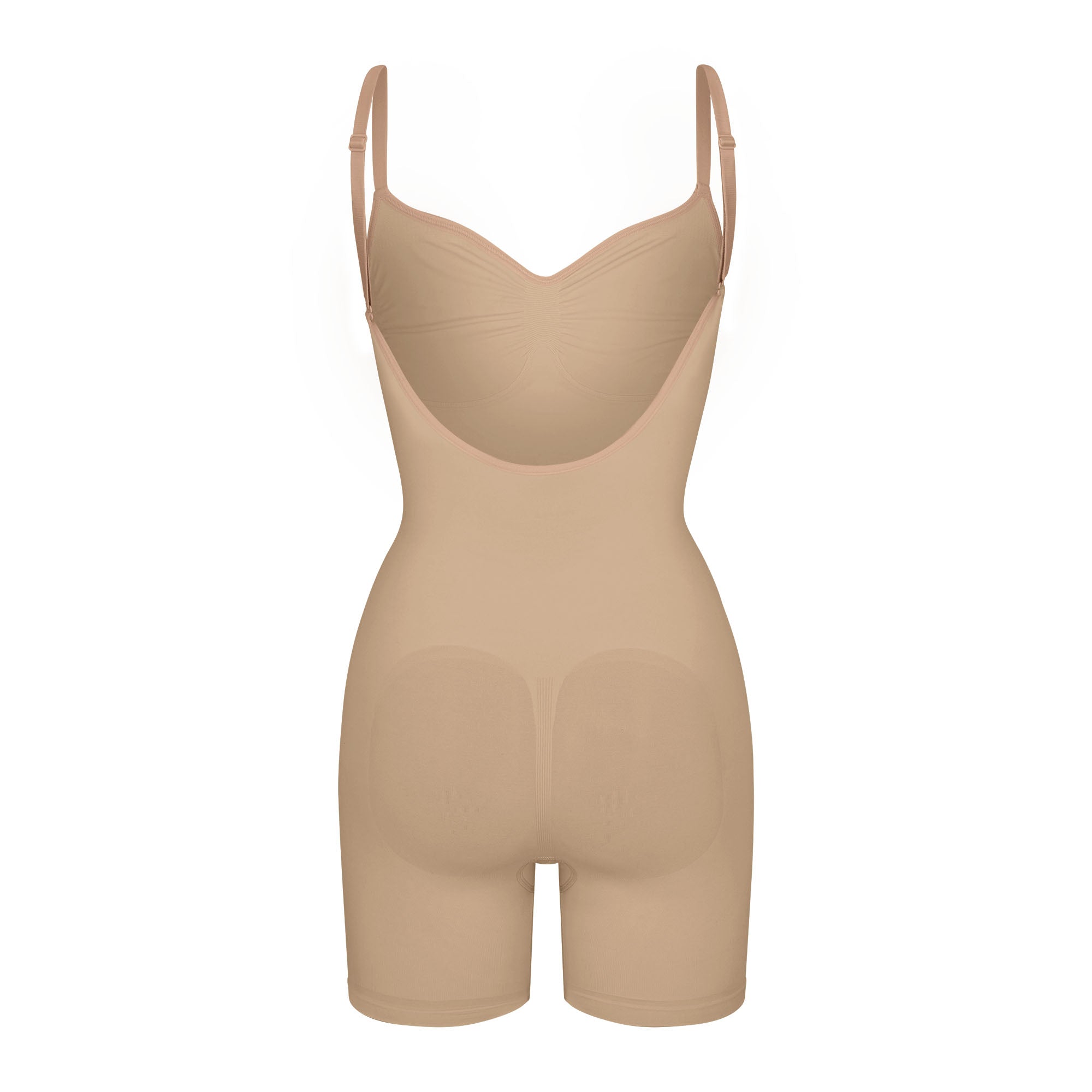SEAMLESS SCULPT LOW BACK MID THIGH BODYSUIT LAYS FLAT ON A WHITE BACKGROUND | FLT