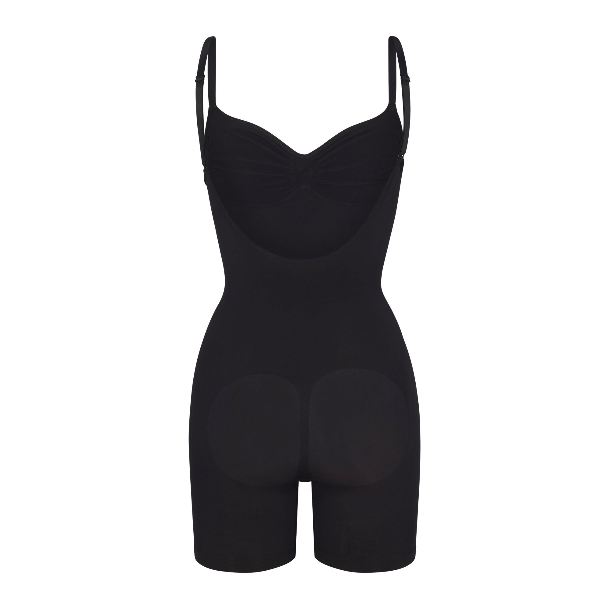 SEAMLESS SCULPT LOW BACK MID THIGH BODYSUIT LAYS FLAT ON A WHITE BACKGROUND | FLT