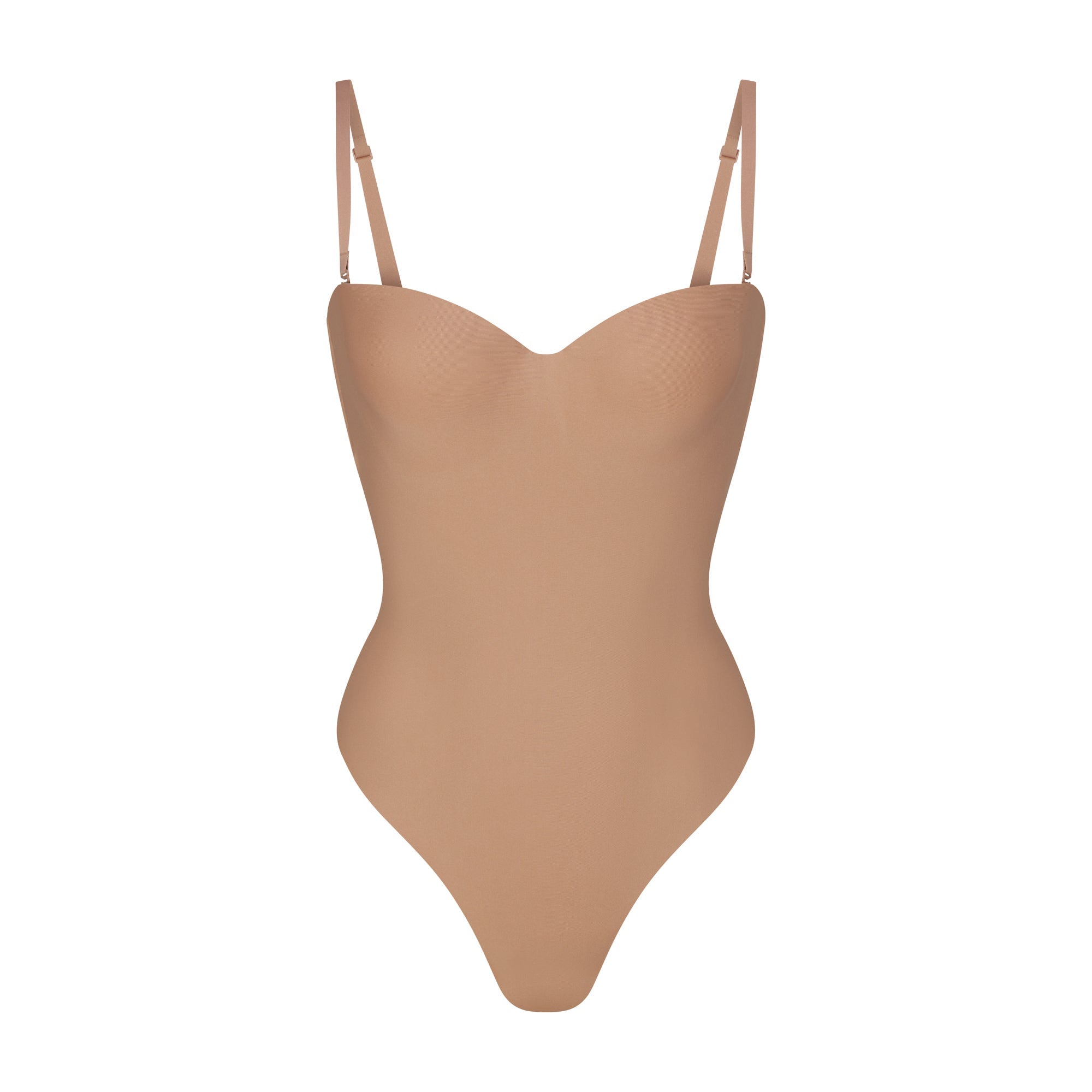 SKIMS BODY UNDERWIRE THONG BODYSUIT | SIENNA (SHAPEWEAR BODYSUITS, SHAPEWEAR) LAYS FLAT ON A WHITE BACKGROUND | FLT