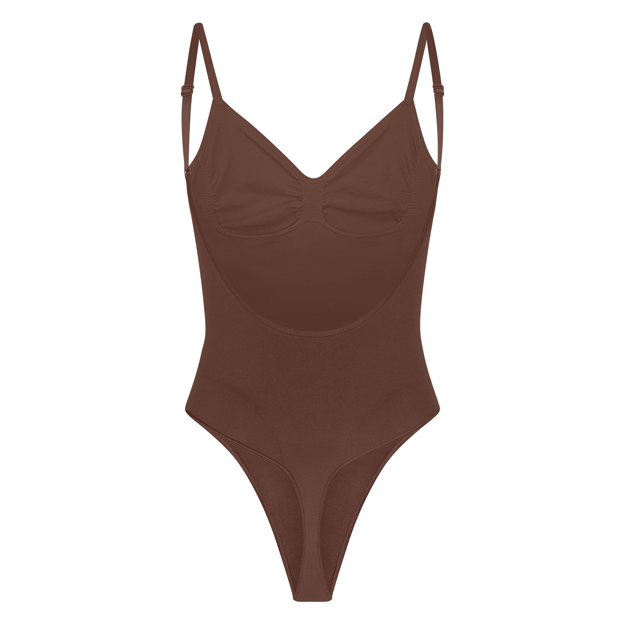 SEAMLESS SCULPT LOW BACK THONG BODYSUIT LAYS FLAT ON A WHITE BACKGROUND | FLT