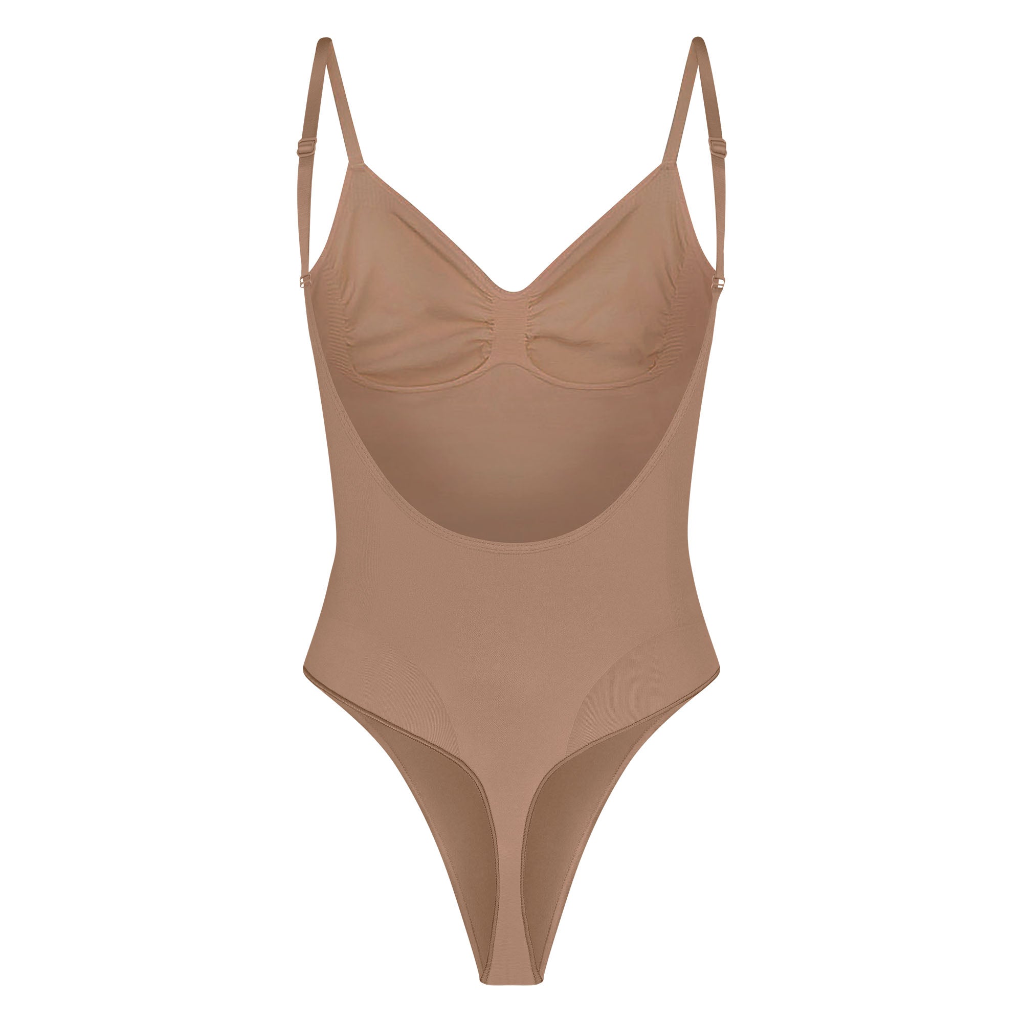 SEAMLESS SCULPT LOW BACK THONG BODYSUIT LAYS FLAT ON A WHITE BACKGROUND | FLT