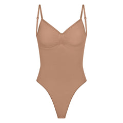 SEAMLESS SCULPT LOW BACK THONG BODYSUIT | SIENNA (LOW BACK SHAPEWEAR, BODYSUITS) LAYS FLAT ON A WHITE BACKGROUND | FLT