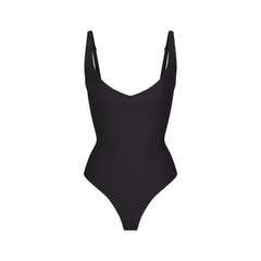 SKIMS BODY CORE SCULPT PLUNGE THONG BODYSUIT | ONYX (SHAPEWEAR BODYSUITS) FLAT ON A WHITE BACKGROUND | FLT