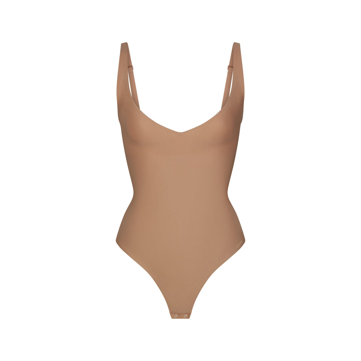 SKIMS BODY CORE SCULPT PLUNGE THONG BODYSUIT | SIENNA (SHAPEWEAR BODYSUITS) FLAT ON A WHITE BACKGROUND | FLT