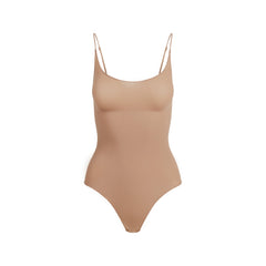 SHEER SEAMLESS THONG BODYSUIT | SIENNA FLAT ON A WHITE BACKGROUND | FLT