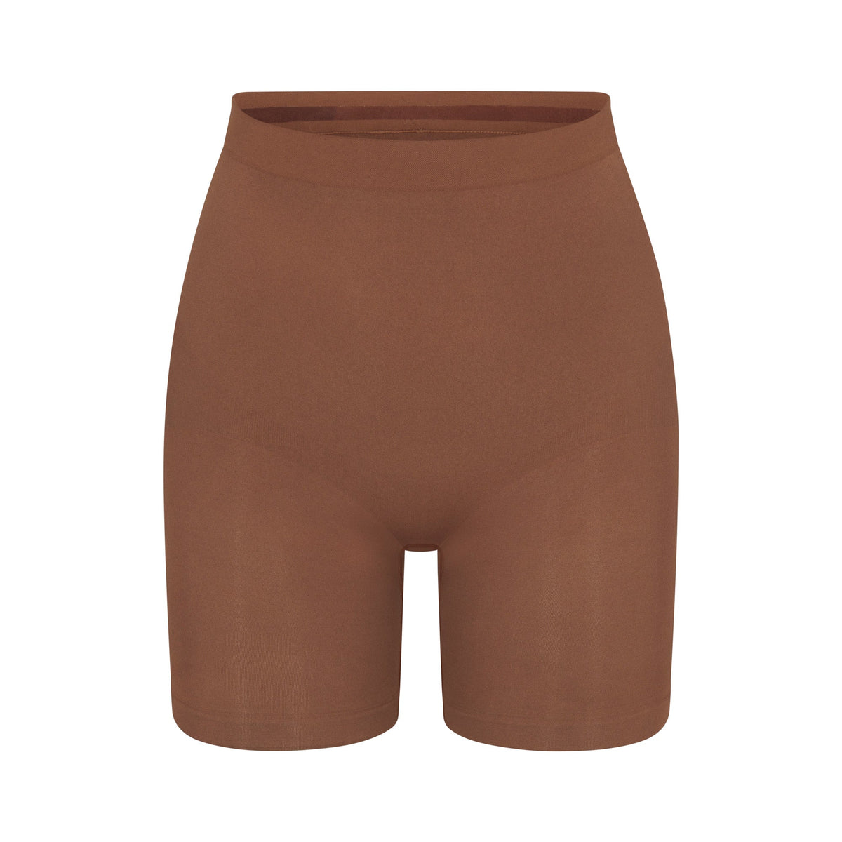 SEAMLESS SCULPT MID THIGH SHORT | JASPER (SHAPEWEAR SHORTS, SHAPEWEAR) LAYS FLAT ON A WHITE BACKGROUND | FLT