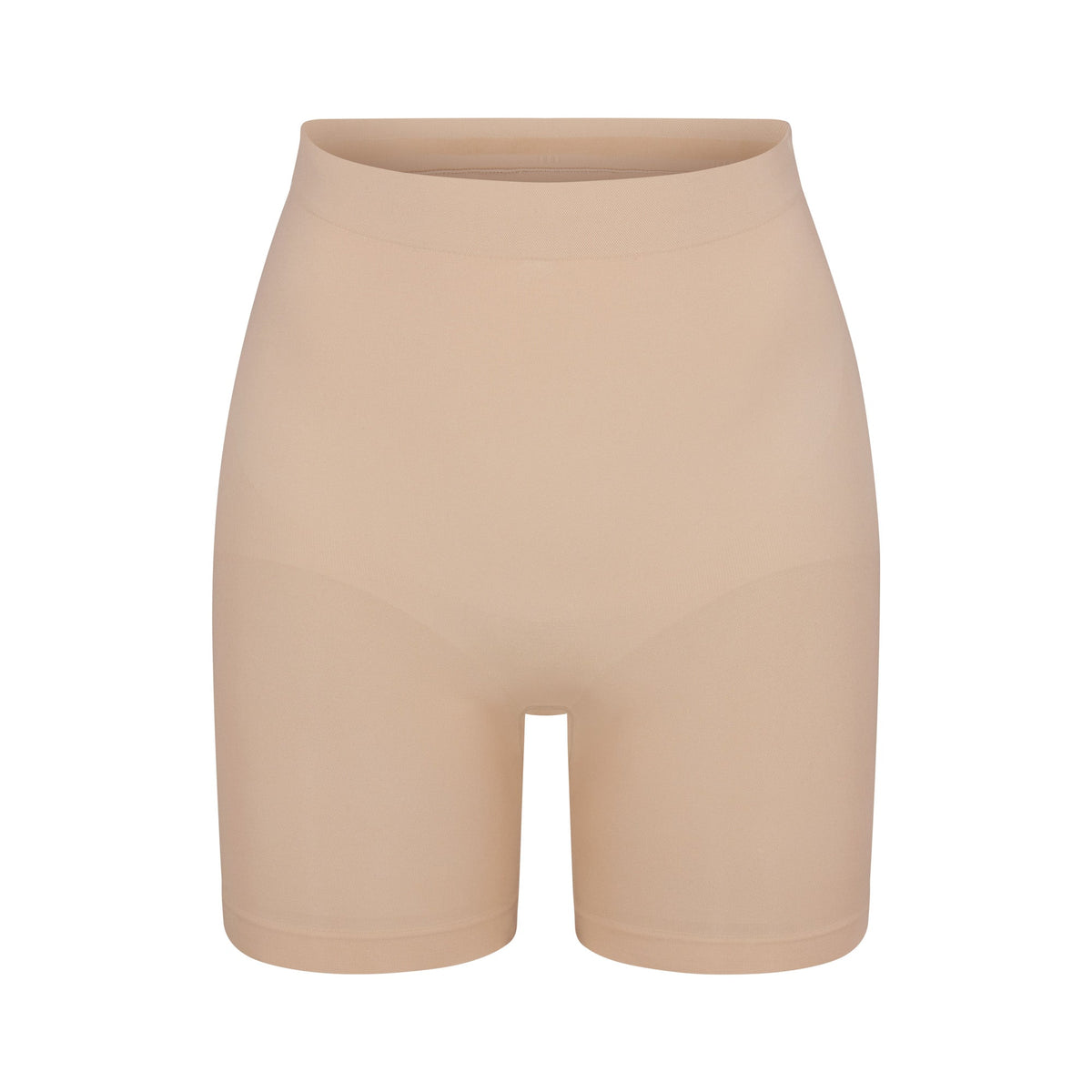 SEAMLESS SCULPT MID THIGH SHORT | MICA (SHAPEWEAR SHORTS, SHAPEWEAR) LAYS FLAT ON A WHITE BACKGROUND | FLT