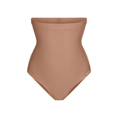 SKIMS BODY CORE SCULPT HIGH-WAISTED BRIEF | SIENNA FLAT ON A WHITE BACKGROUND | FLT | FLT