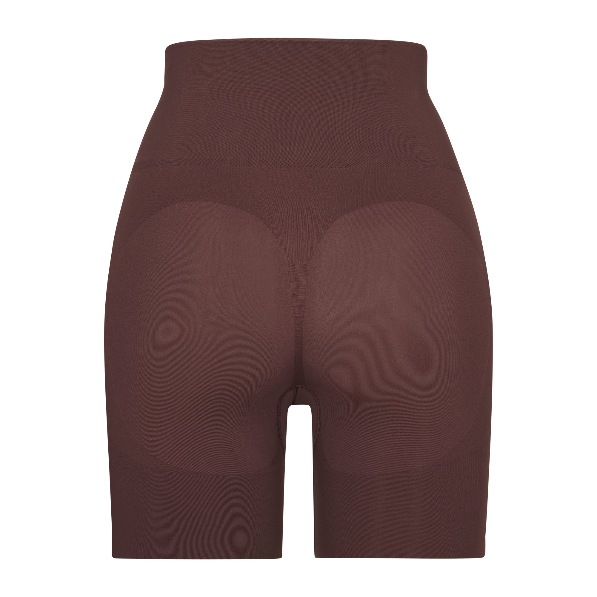 BUTT ENHANCING SHORT LAYS FLAT ON A WHITE BACKGROUND | FLT