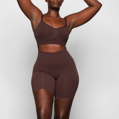 BUTT ENHANCING SHORT WORN BY A MODEL IN FRONT VIEW, XL