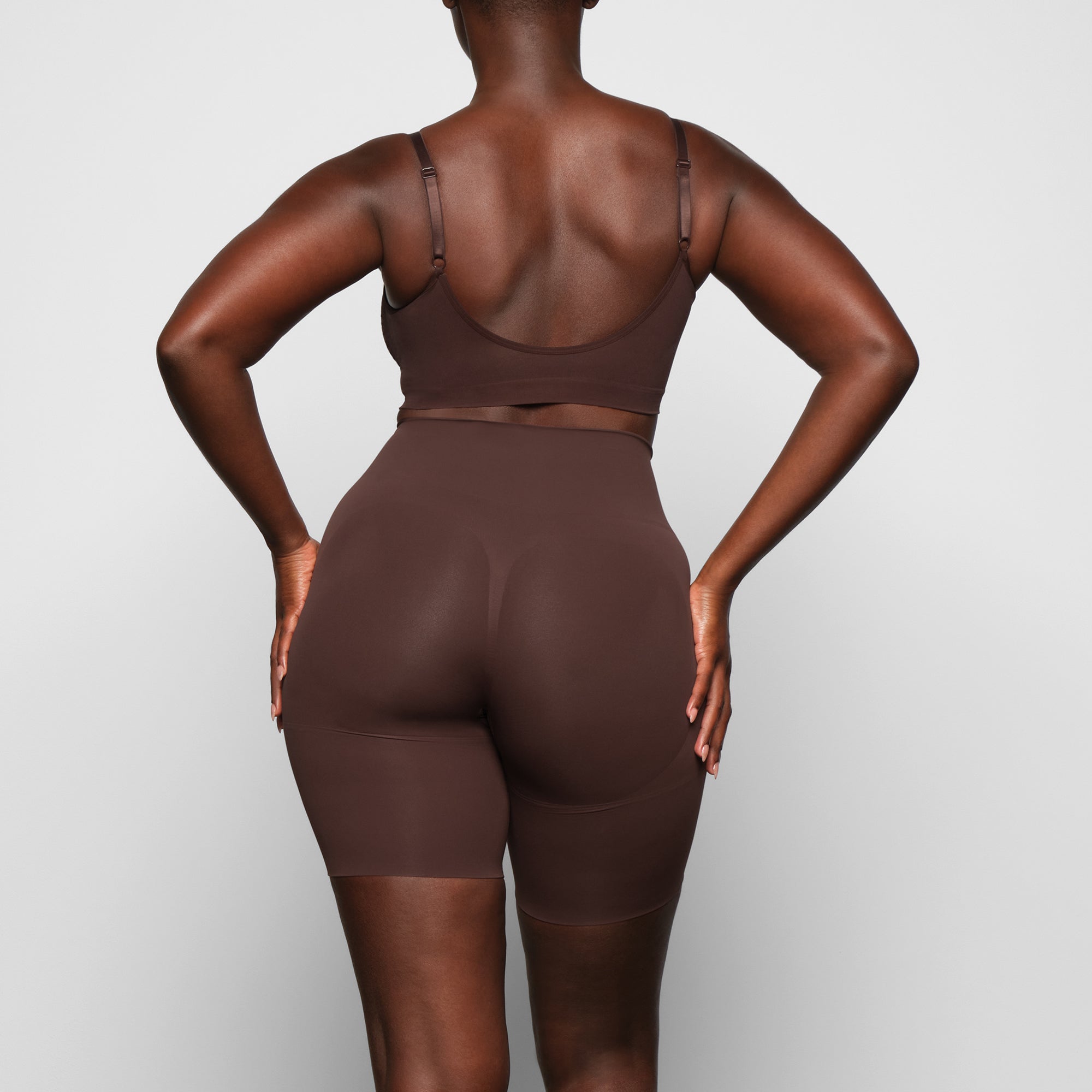 BUTT ENHANCING SHORT ON A MODEL BACK VIEW