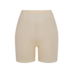 SHEER SCULPT LOW BACK SHORT | SAND (LOW BACK SHAPEWEAR, SHAPEWEAR) LAYS FLAT ON A WHITE BACKGROUND | FLT