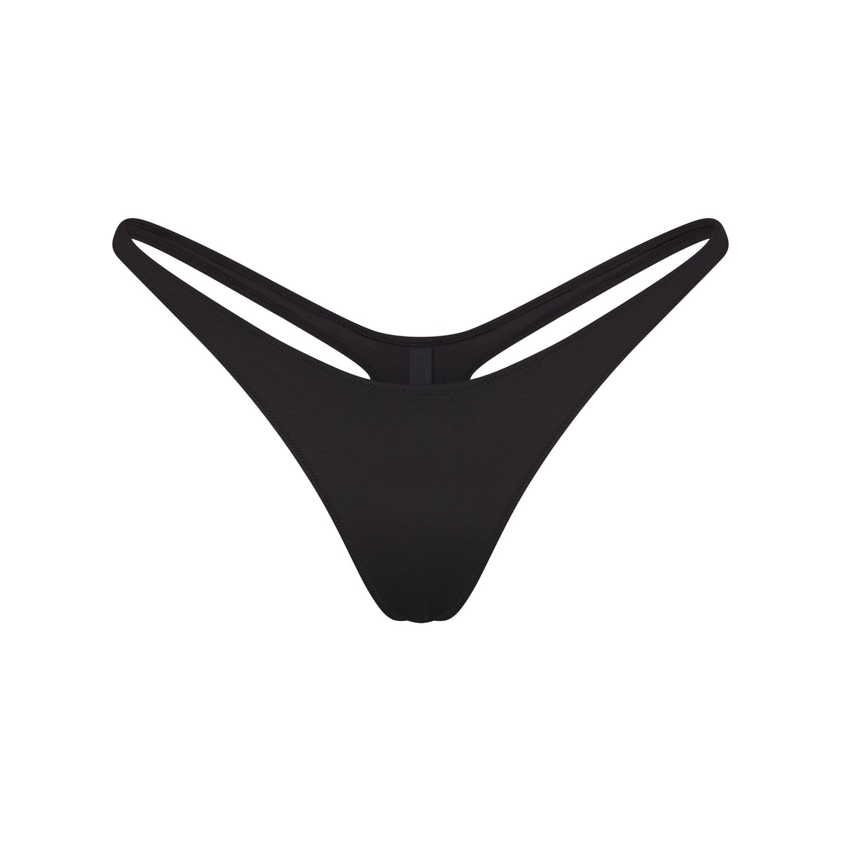 SIGNATURE SWIM THONG BIKINI BOTTOM | ONYX FLAT ON A WHITE BACKGROUND | FLT